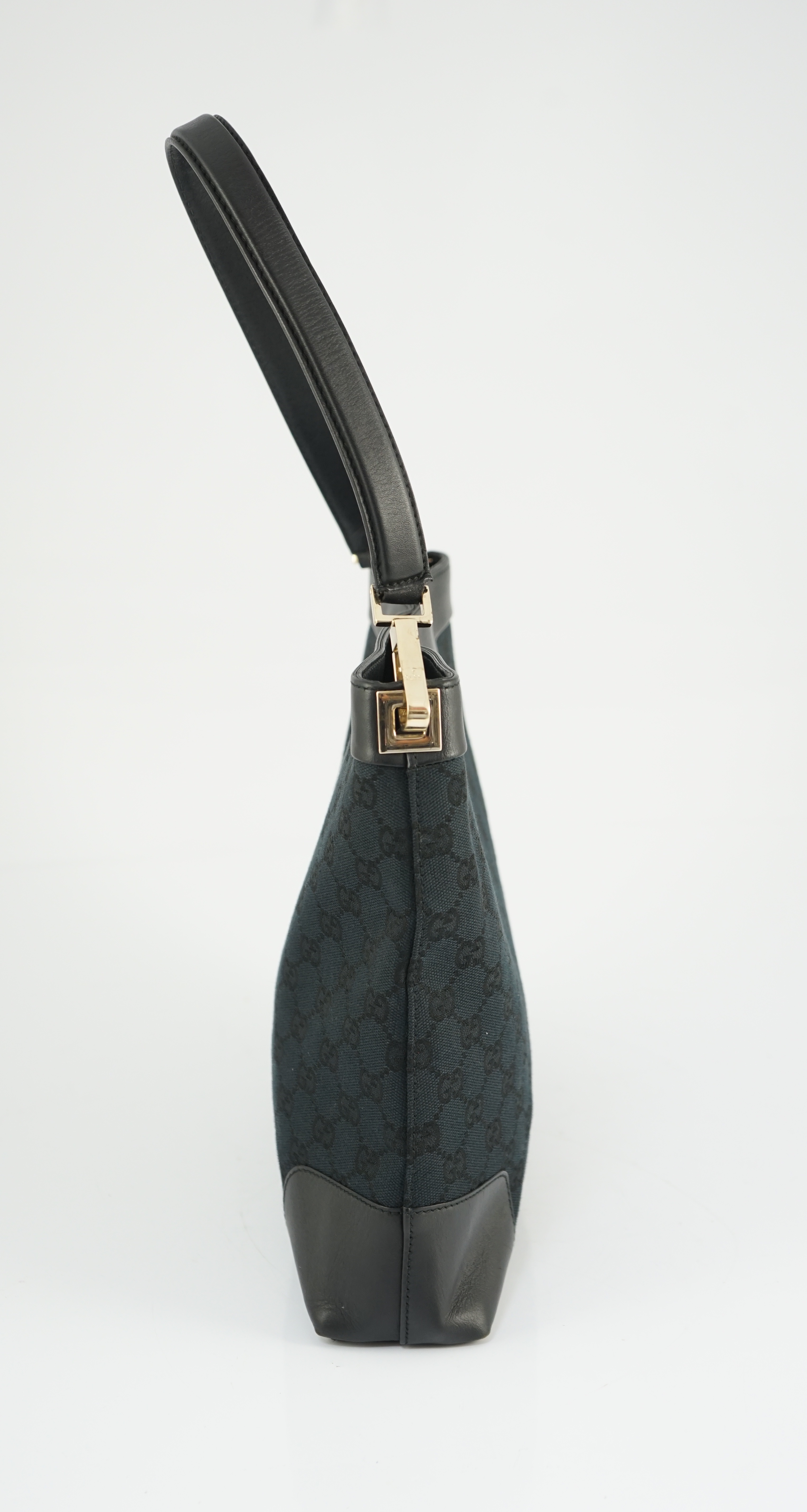 A Gucci black GG canvas shoulder bag width 26cm, depth 6cm, approx height 25cm